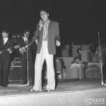 Adriano Celentano canta durante la tappa romana del Cantagiro al Palazzo dello Sport, 1964